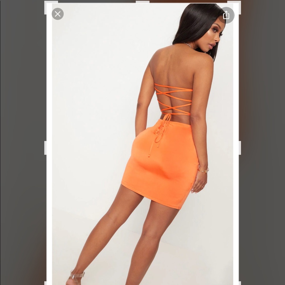 $Shape orange slinky lace up back bodycon Dress